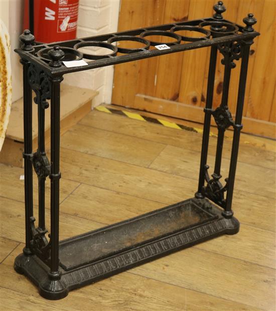 A Victorian cast iron stick and umbrella stand W.64cm